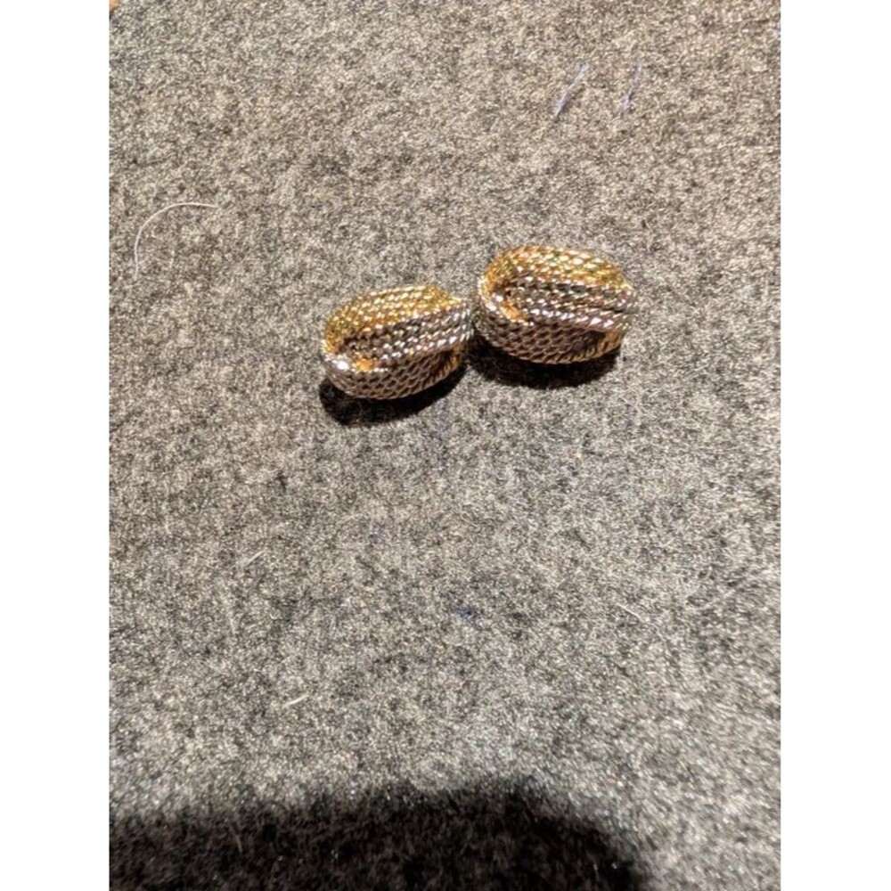 Gold and silver diamond cut earrings